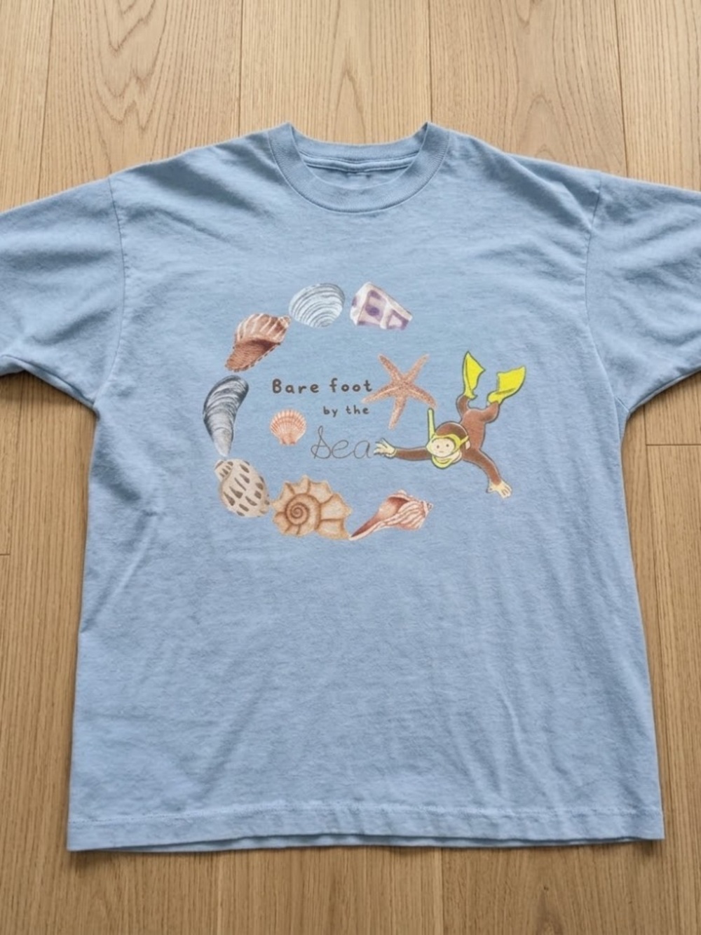 Bare Foot by the Sea Graphic Tee - Light Blue